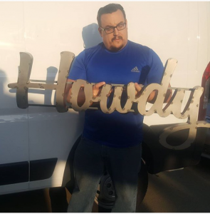 Howdy lauundromat sign