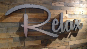 Relax industrial metal sign