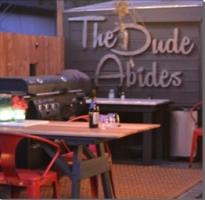 The Dude Abides sign metal